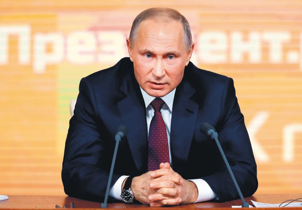 Russian President Vladimir Putin speaks during his annual end-of-year news conference in Moscow, Dec. 14.
