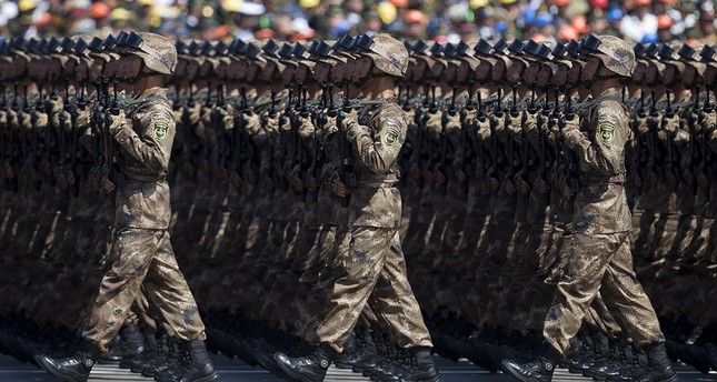 Chinese soldiers march during a military parade to commemorate the 70th anniversary of the end of WWII. (REUTERS Photo)