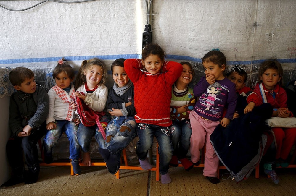 Syrian refugee children play in a kindergarten at the Midyat refugee camp in the southeastern province of Mardin, June 6.