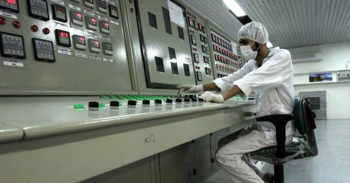 In this Feb. 3, 2007 file photo, an Iranian technician works at the Uranium Conversion Facility just outside the city of Isfahan, Iran, 255 miles (410 kilometers) south of the capital Tehran. (AP Photo)