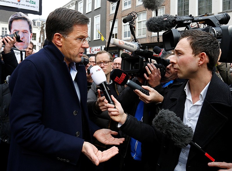 Dutch Prime Minister Mark Rutte of the VVD Liberal party speaks to the media as he campaigns for the 2017 Dutch election in Breda, Netherlands March 11, 2017. (Reuters Photo)