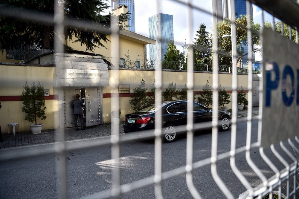A security team member opens the door to the Saudi Consulate in Istanbul, where journalist Jamal Khashoggi was killed, Oct. 10.