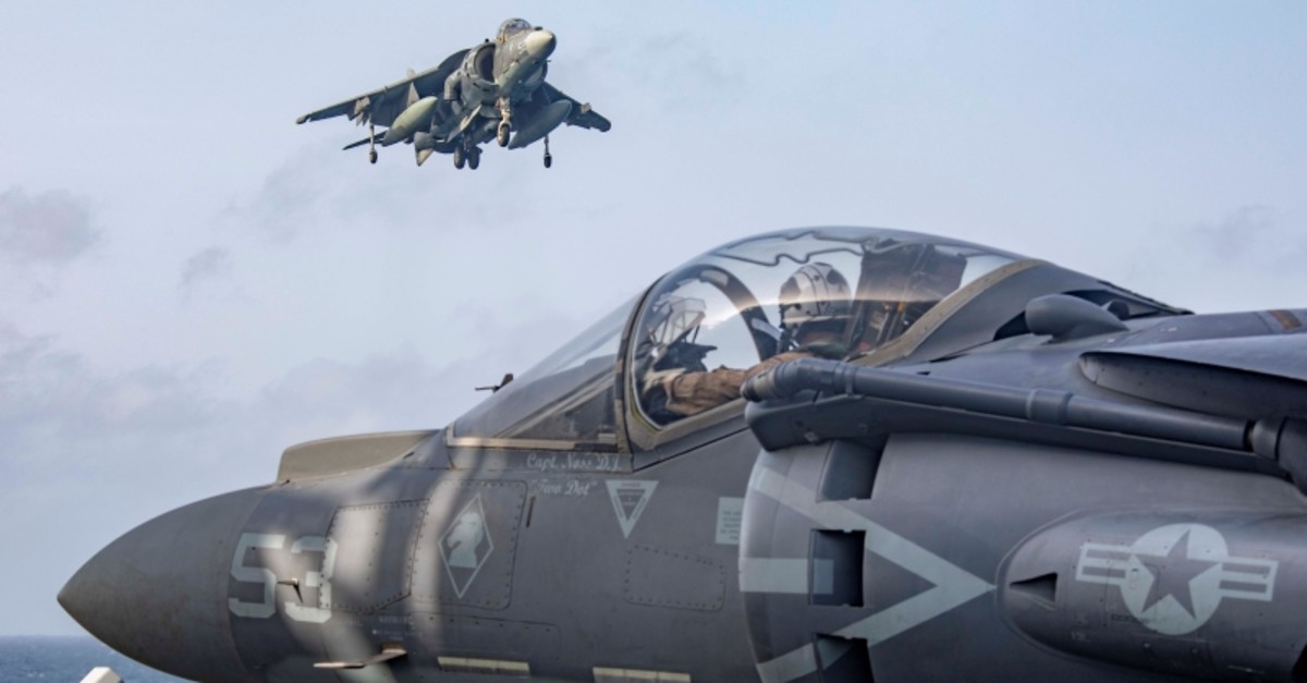 U.S. AV-8B Harriers return to the flight deck after participating in an exercise with F/A-18E Super Hornets embarked aboard the Nimitz-class aircraft carrier USS Abraham Lincoln in the Arabian Sea May 18, 2019. (Reuters Photo)