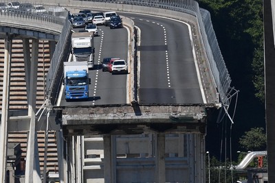 A view of the Morandi bridge the day after it collapsed, in Genoa, Italy, 15 August 2018. (EPA Photo)