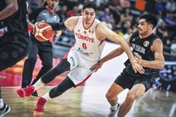 Cedi Osman (L) broke his international career-high record with 32 points in the World Cup game against New Zealand, Sept. 9, 2019.