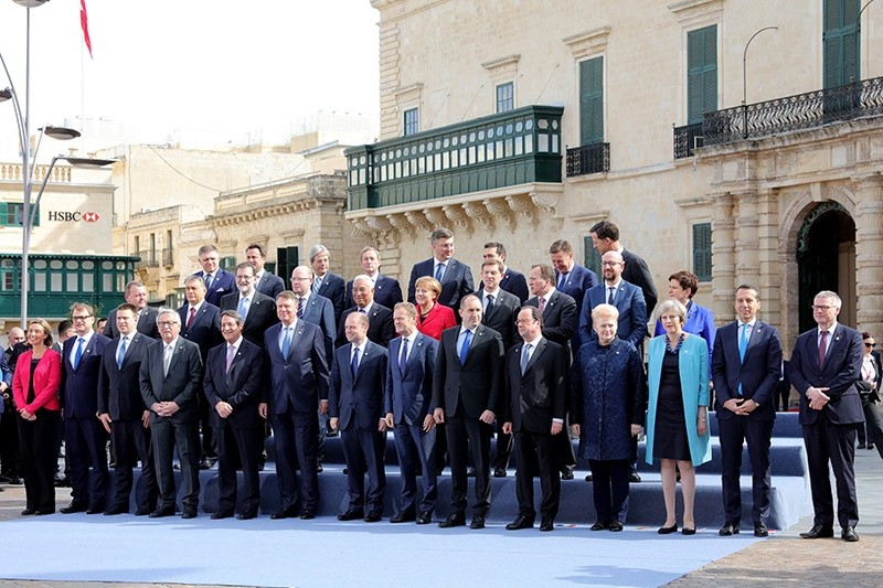 Participants pose for the family photo during an informal summit meeting of EU leaders in Valletta, Malta, 03 February 2017. (EPA Photo)