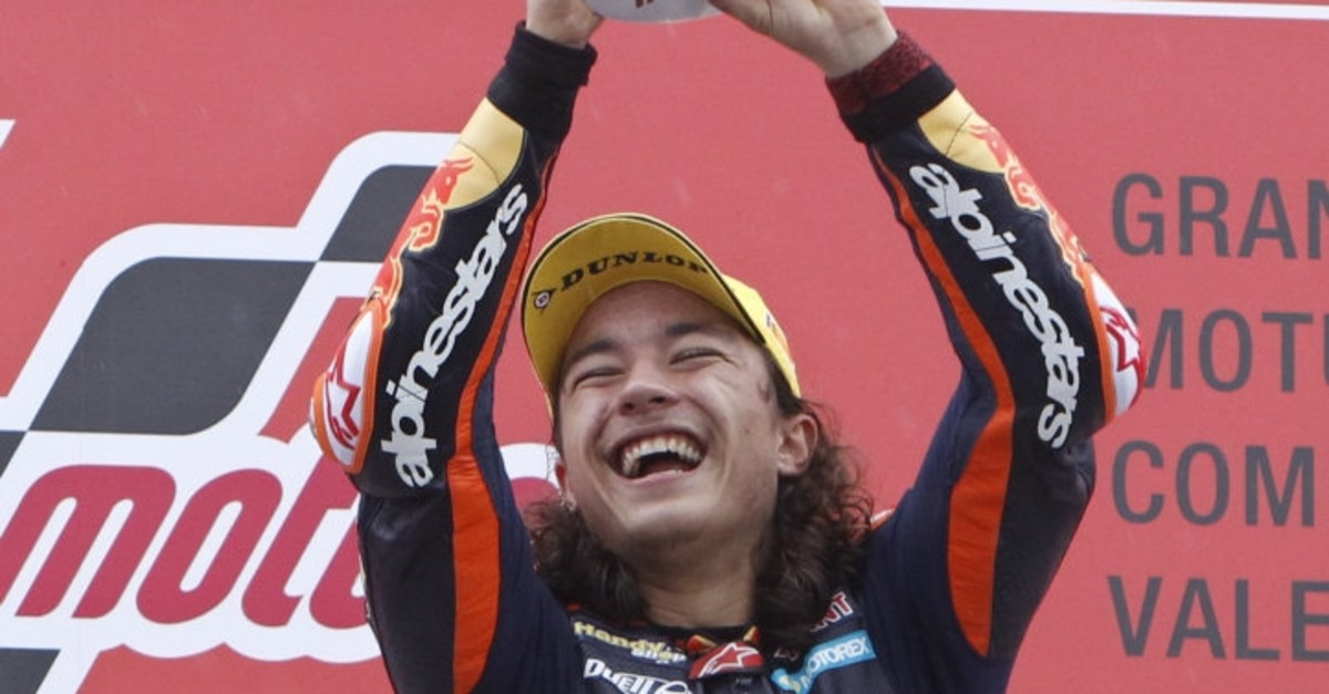 Can u00d6ncu00fc of Turkey celebrates after winning the Moto3 Motorcycle Grand Prix at the Ricardo Tormo Circuit in cheste near Valencia, Spain, Nov. 18, 2018.