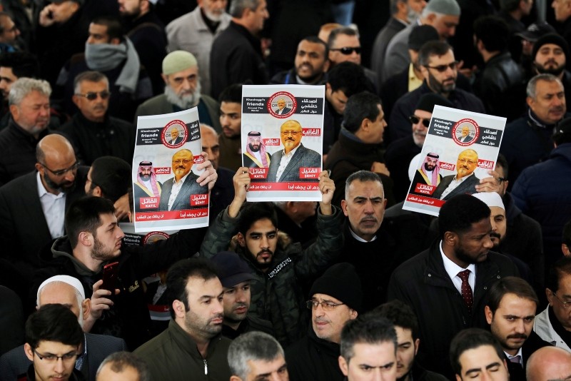 This file photo shows people holding pictures of Saudi journalist Jamal Khashoggi attend a symbolic funeral prayer for Khashoggi at the courtyard of Fatih Mosque in Istanbul, Turkey Nov. 16, 2018. (Reuters Photo)