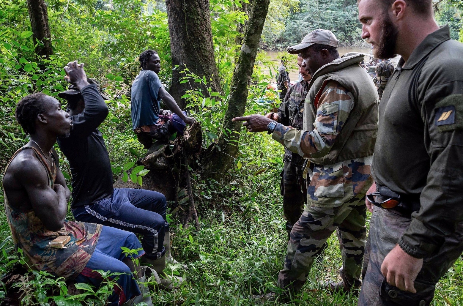 Members of the 9th Marine Infantry Regiment ust caught three illegal gold panners on a path in the jungle as part of the Harpie Operation conducted by French Guiana Armed Forces and gendarmes to fight illegal gold panning in French Guiana, Jan. 20.