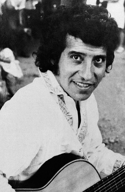 In this undated file photo, Chilean singer and songwriter Victor Jara poses for a portrait in an unknown location in Chile. (AP Photo)