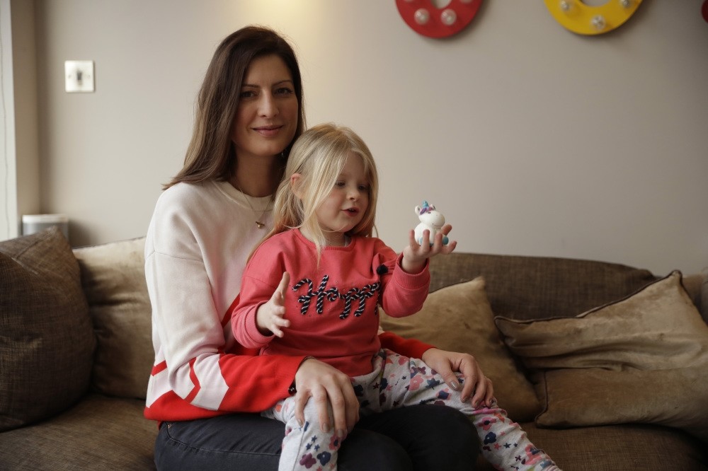 Victoria Mickleburgh and her daughter Grace pose for photographs at their home. Things are already tough for Mickleburgh, whose 3-year-old daughter Grace, has Type 1 diabetes and needs insulin daily, Cobham, London, Jan. 23, 2019.
