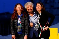 Beppe Grillo (C), the founder of the anti-establishment 5-Star Movement, is seen with party members during a march in opposition to the constitutional reform referendum in Rome.