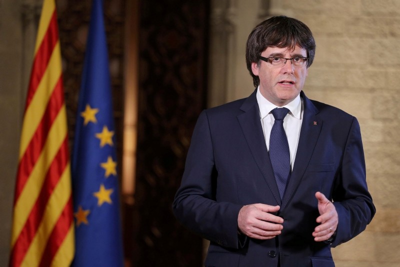 Catalan President Carles Puigdemont gives a speech at the Palau de la Generalitat, the regional government headquarters in Barcelona, Spain, October 21, 2017. (Reuters Photo)