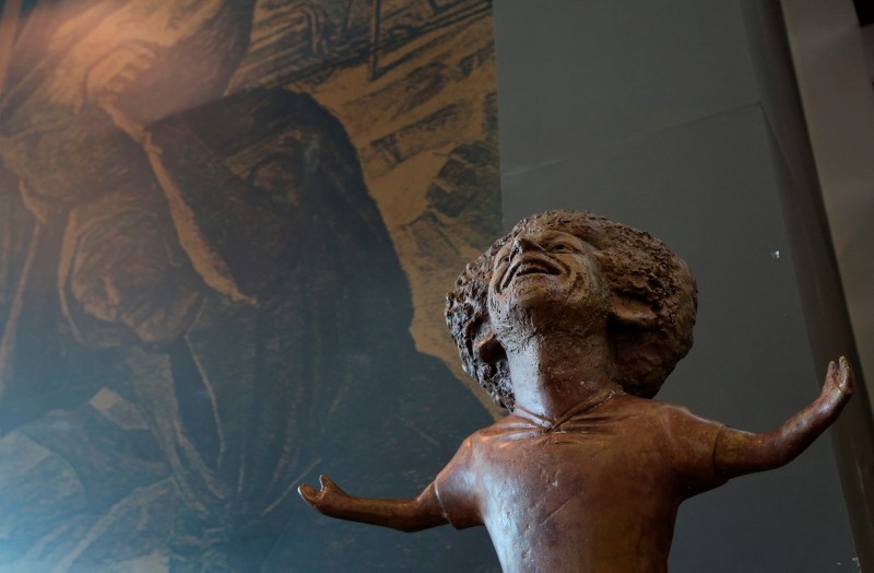 A bronze statue of Liverpool striker Mohammed Salah is on display in a conference hall at an international youths gathering, in Sharm El Sheikh, Egypt, Monday, Nov. 5, 2018. (AP Photo)