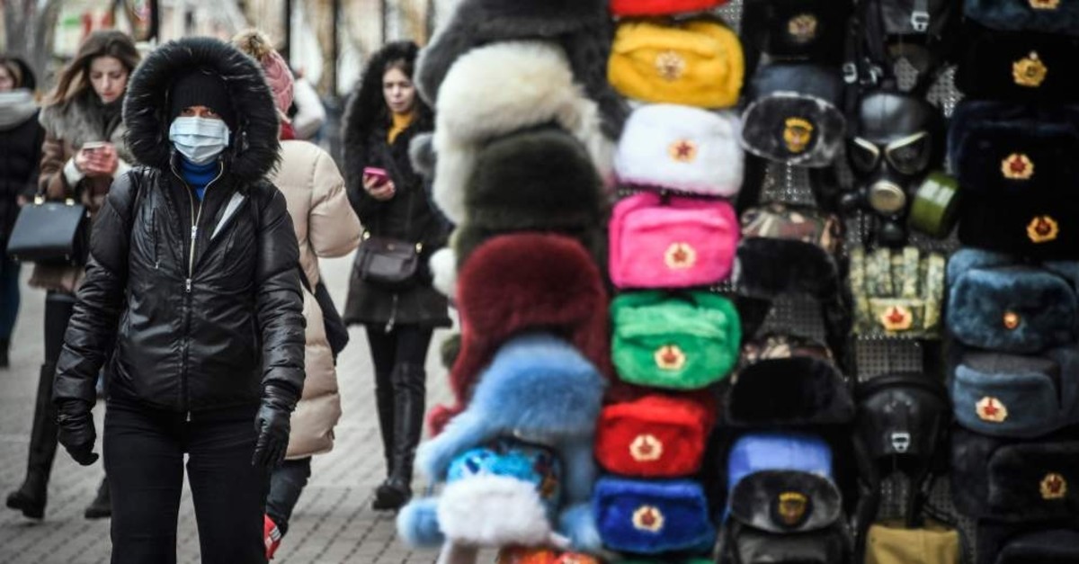 People walk along Arbat pedestrian street in downtown Moscow, Feb. 19, 2020. (AFP Photo)