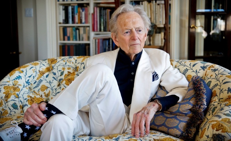 American author and journalist Tom Wolfe, Jr. appears in his living room during an interview about his latest book, ,The Kingdom of Speech,, in New York. (AP Photo)