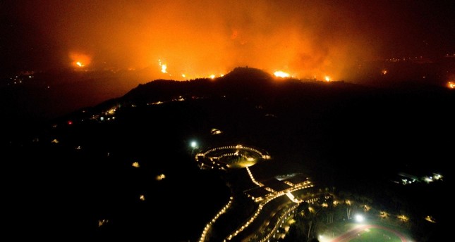 الحرائق في اليونان تمتد إلى مدينة أوليمبا التاريخية مهد الألعاب الأوليمبية في العالم