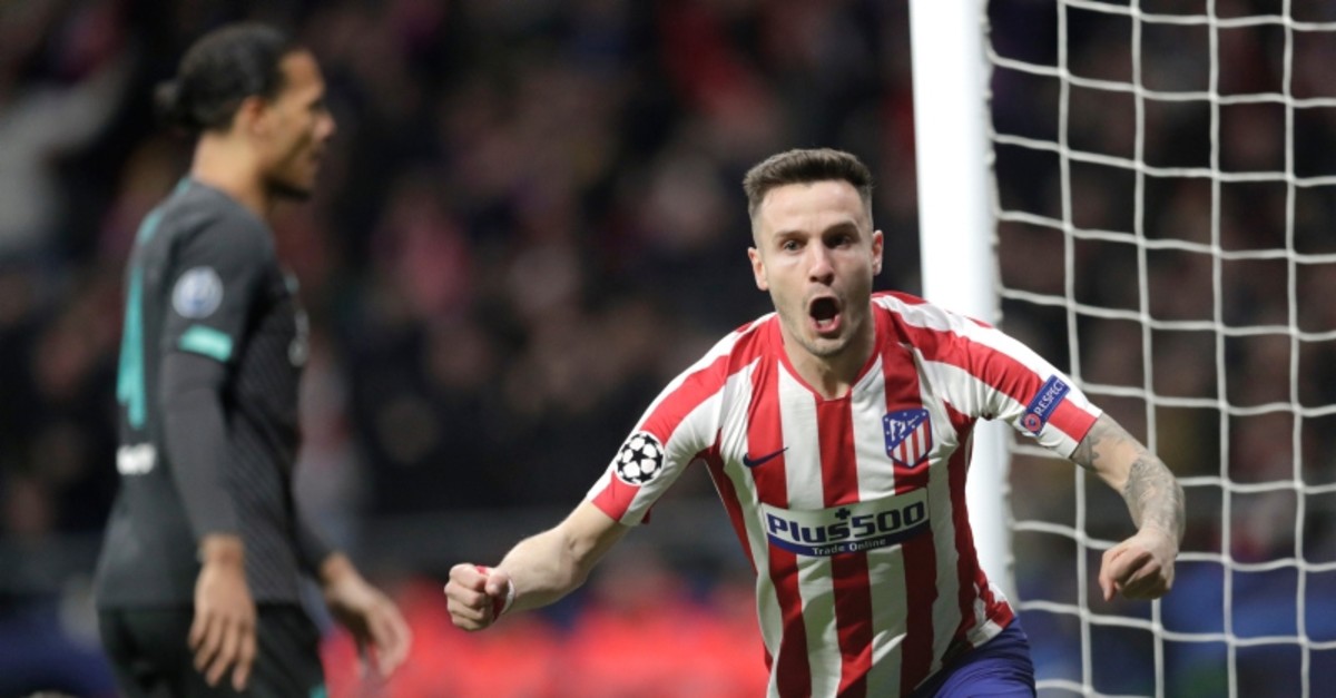 Atletico Madrid's Saul celebrates after scoring his side's first goal during a first leg, round of 16, Champions League match against Liverpool in Madrid, Feb. 18, 2020. (AP Photo)