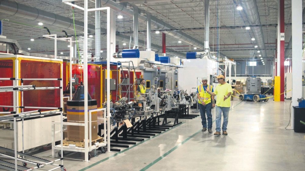 The new Faurecia SA plant in Columbus, where digitalized and robotic production requires high skilled workers.