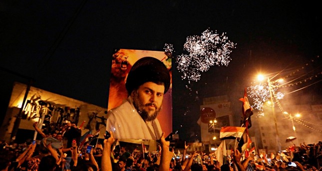 أنصار الصدر يحتفلون بفوزهم في الانتخابات AP