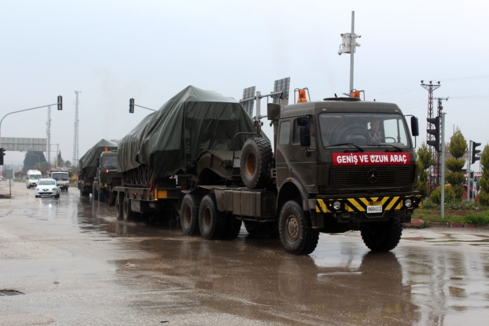 Trucks carry tanks in Turkey's southern city of Hatay as Ankara prepares to launch a counterterrorism offensive against PKK-affiliated elements in Afrin, Syria, near its border, Jan. 16. 