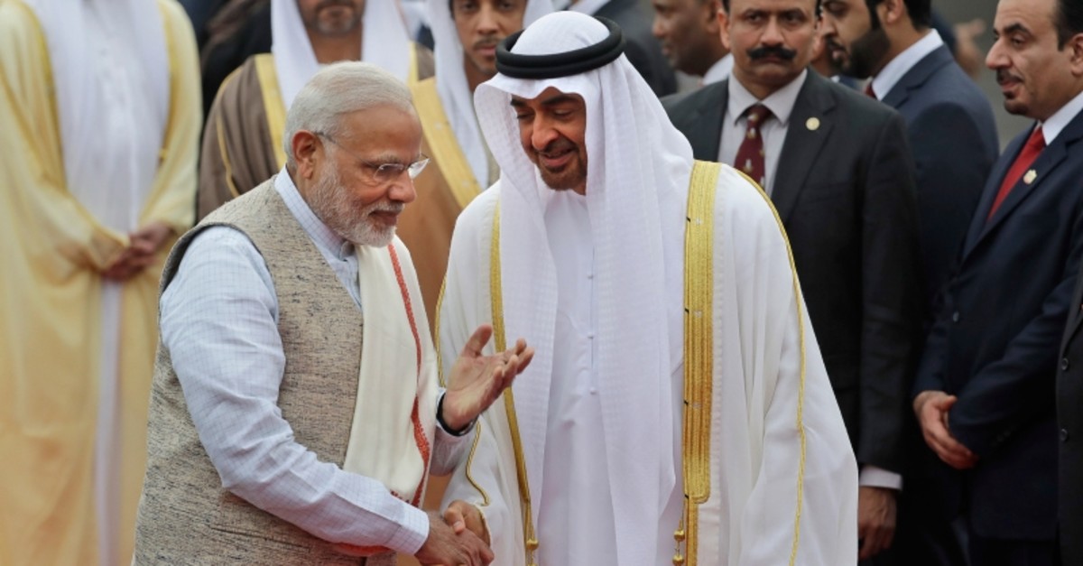 In this Jan. 24, 2017 file photo, Indian Prime Minister Narendra Modi, left, gestures as he receives Abu Dhabi's Crown Prince, Sheikh Mohammed bin Zayed Al Nahyan at the airport in New Delhi, India. (AP Photo)