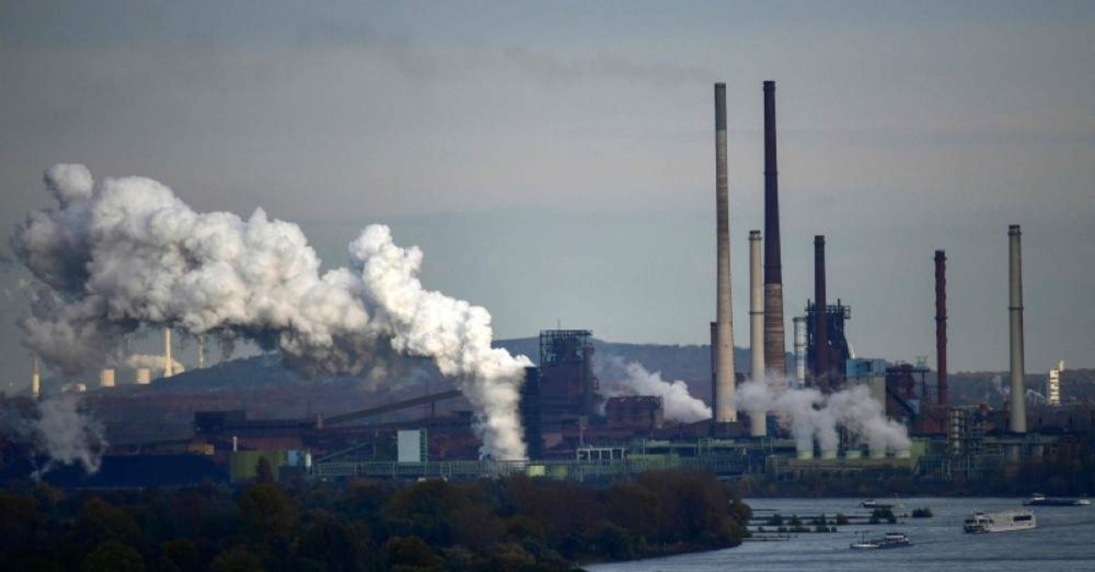A picture taken on November 11, 2019 shows steam rising from the coking plant at the ThyssenKrupp steel production in Duisburg. (AFP Photo)