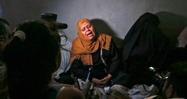 The mother of Palestinian Ahmed Omar, who was killed during a protest near the Israeli Erez crossing with the Gaza Strip, mourns on Sept. 19.