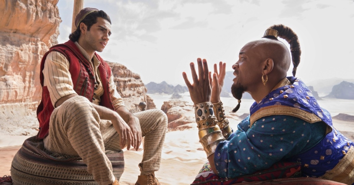 Mena Massoud as Aladdin, (L), and Will Smith as Genie in Disney's live-action adaptation of the 1992 animated classic ,Aladdin.,