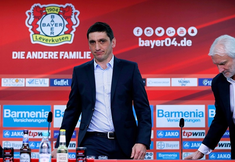 Bayer Leverkusen's new head coach Tayfun Korkut (L) and Bayer's sports director Rudi Voeller attend a press conference for Korkut's presentation as new coach of the German Bundesliga soccer club in Leverkusen, Germany, March 06, 2017. (EPA Photo)