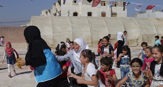 Syrian children participate in various activities during the Unlimited Festival organized by Turkey's International Refugee Rights Association in Al-Bab after it was cleared from terrorists in Operation Euphrates Shield in Sept. 2019. AA Photo