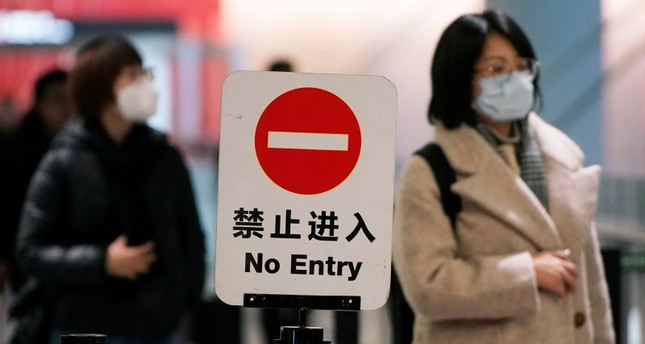 الصين تؤكد انتقال فيروس غامض يشبه السارس بين البشر
