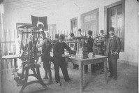 Students in Damascus print and bind books under the supervision of their teacher in the 20th century Ottoman Empire.