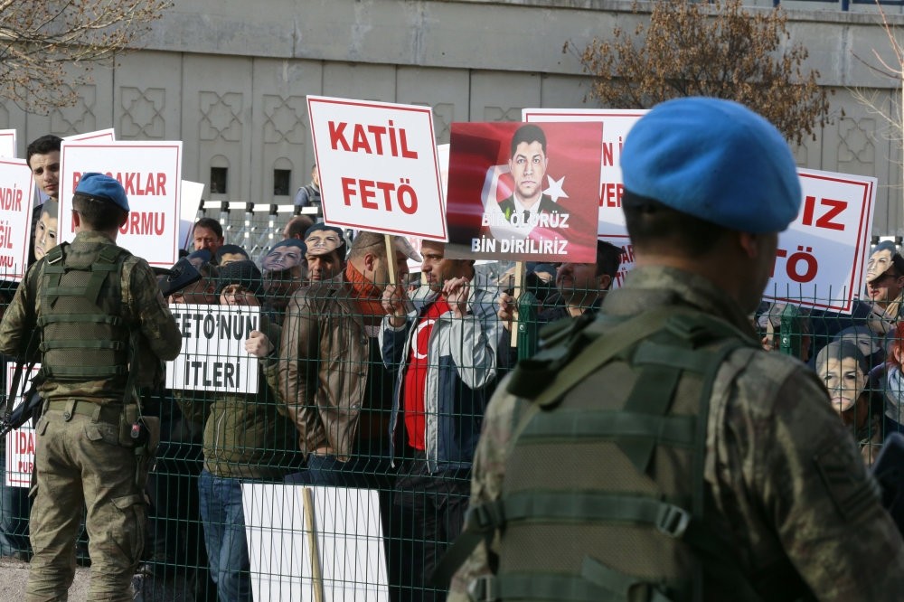 A group of activists stage a protest outside a courthouse in Ankara, denouncing FETu00d6, which is blamed for the coup attempt. The terror group faces a number of trials for involvement in the putsch bid.