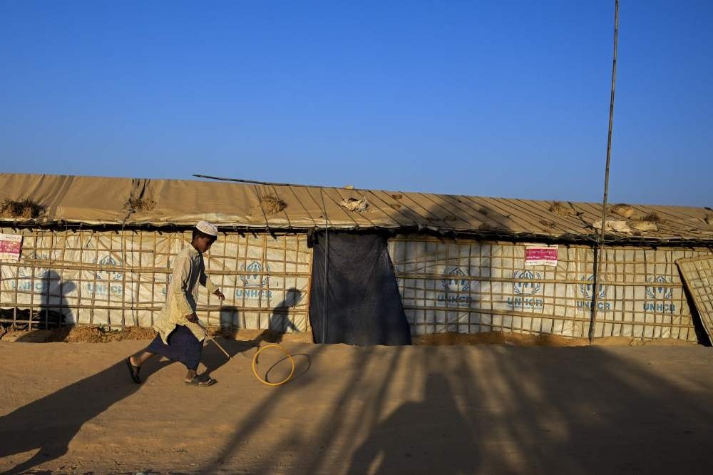 A young Rohingya refugee plays in Balukhali refugee camp, Ukhia, Feb. 4, 2019.
