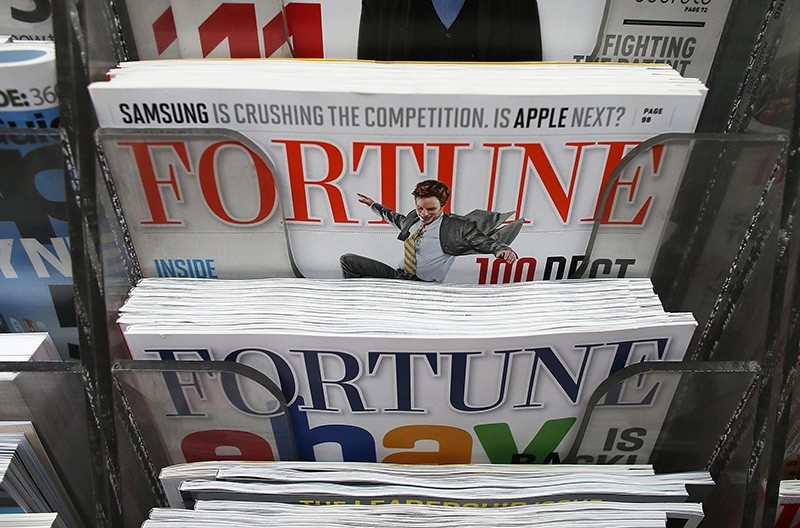 In this file photo taken on February 13, 2013, issues of Fortune magazine are for sale at a newsstand in Manhattan on Feb. 13, 2013 in New York City. (AFP Photo)
