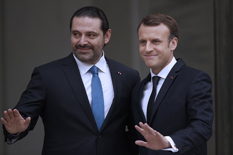French President Emmanuel Macron (R) greets Lebanese Prime Minister Saad Hariri (R) upon his arrival at the Elysee Palace in Paris, France, Nov. 18 2017. (EPA Photo)