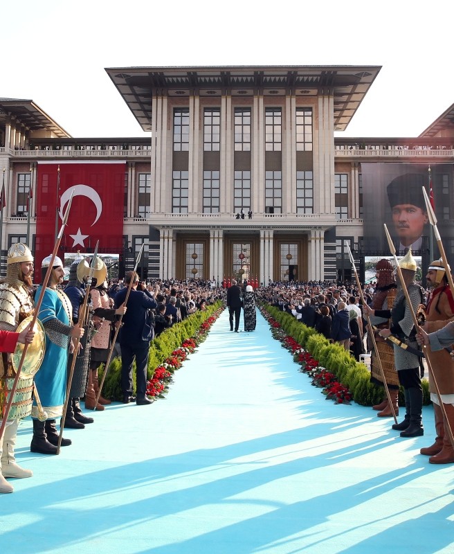 Erdoğan and his wife arrive for a ceremony at the Presidential Complex in Ankara, on July 9, 2018.