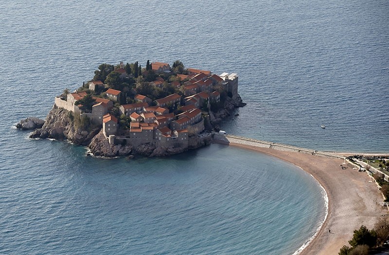 This photo taken Wednesday, March 15, 2017, shows the Sveti Stefan peninsula, a hotel and a tourist resort on the coast of Montenegro. (AP Photo)