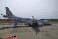 Rescue team gather near a plane of Myanmar National Airline (MNA) after an accident at Mandalay International airport Sunday, May 12, 2019, in Mandalay, Myanmar. (AP Photo)