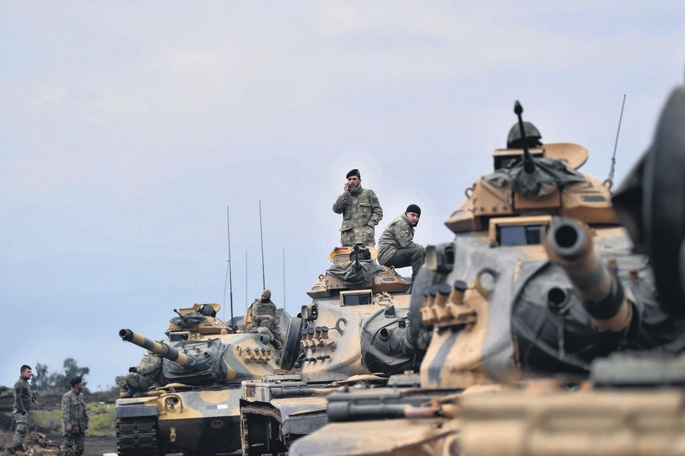 Turkish soldiers with tanks as they wait near the Syrian border before entering Syria for the Afrin operation, Hassa, Hatay, Jan. 21. 