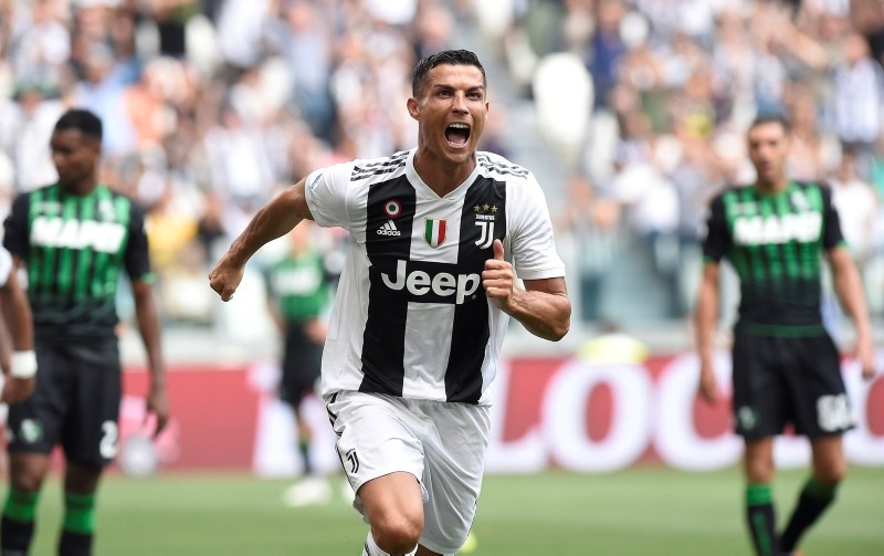 Juventus' Portuguese forward Cristiano Ronaldo celebrates after he scored his first goal since joining the club during the Italian Serie A football match Juventus against Sassuolo at the Juventus Stadium in Turin, Sept. 16, 2018. (Reuters Photo) 