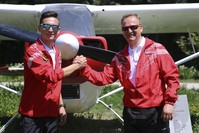 Kerem Dinu00e7er (L) and u0130brahim Dinu00e7er posing for the camera before travelling to Albania.