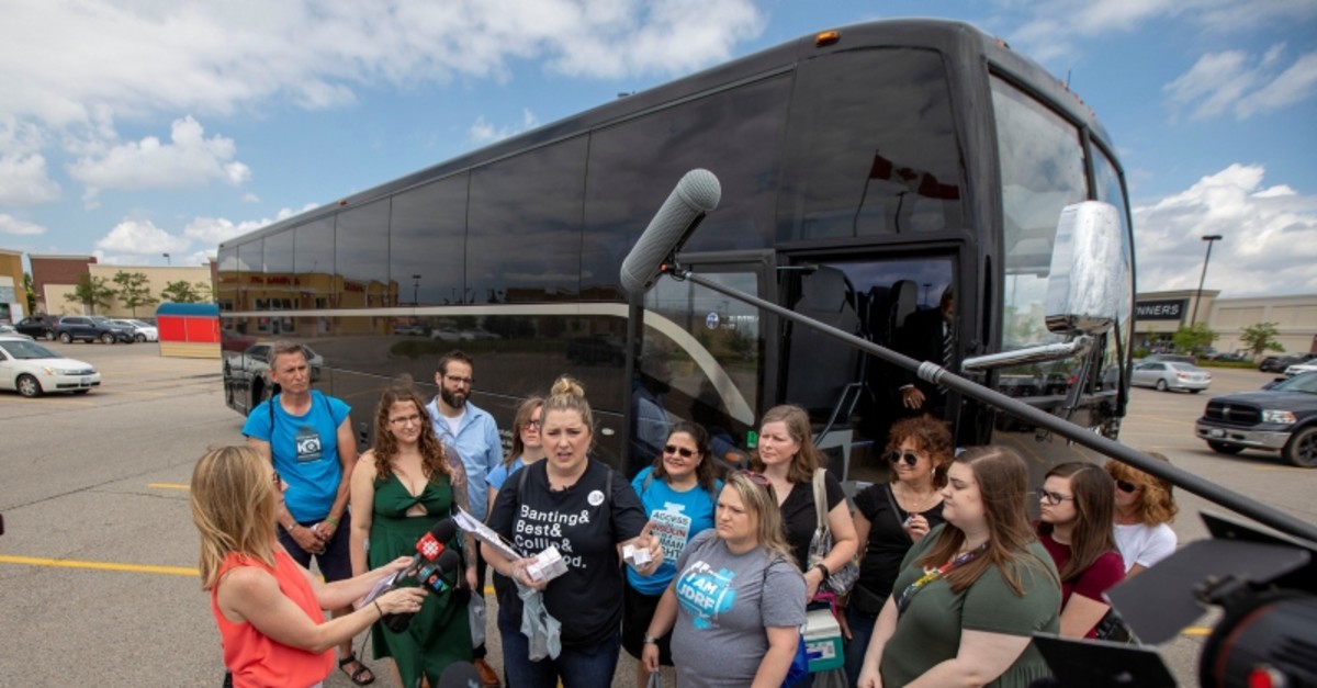 Type 1 diabetes advocates from the United States depart a Canadian pharmacy after purchasing lower cost insulin in London, Ontario, Canada June 29, 2019 (Reuters Photo)