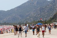 Holidaymakers on a beach in the seaside city of Fethiye in the Muu011fla province, June 5, 2019.
