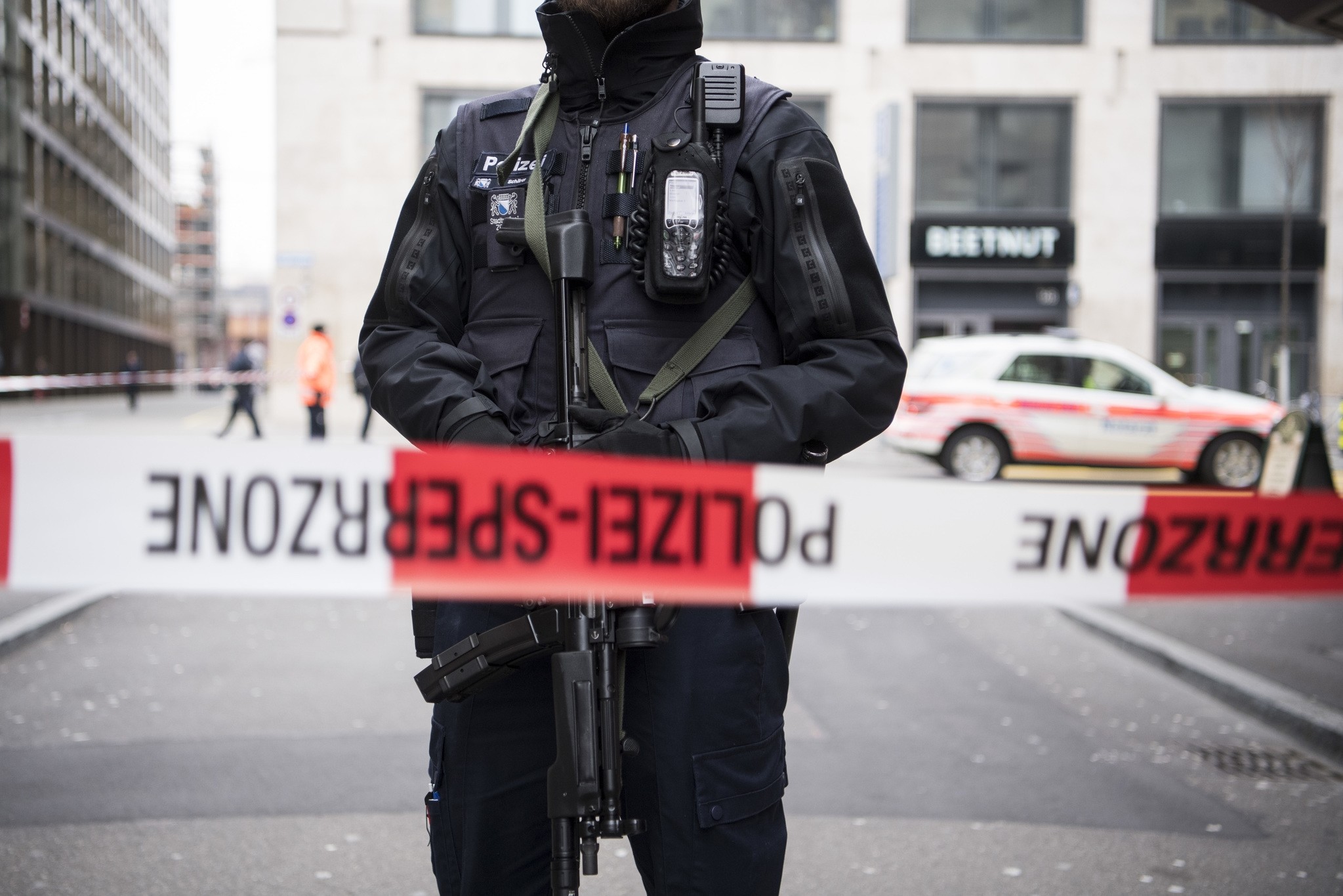 Special police secure an area in Zurich, Switzerland, Friday, Feb. 23, 2018 after a shooting in front of a bank (AP Photo)