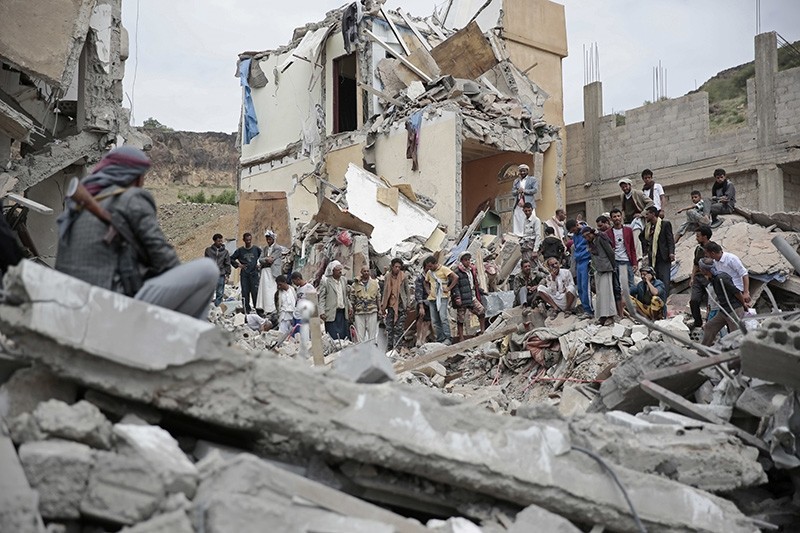 In this Aug. 25, 2017 file photo, people inspect the rubble of houses destroyed by Saudi-led airstrikes in Sanaa, Yemen. (AP Photo)
