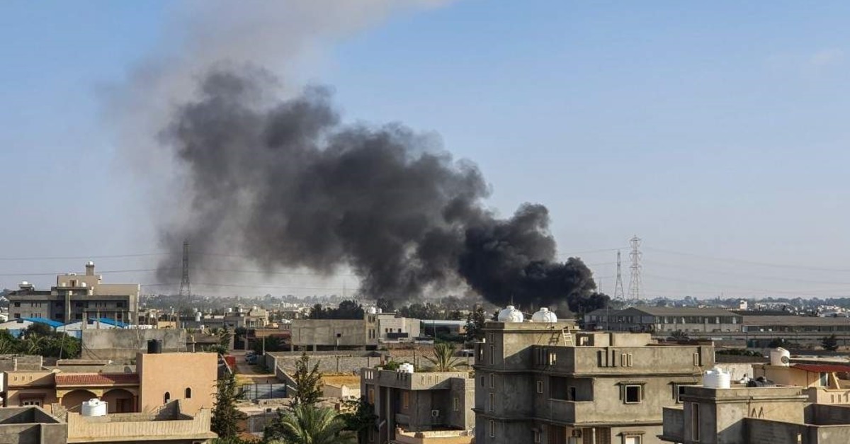 Smoke plumes rising in Tajoura, south of the Libyan capital Tripoli, following a reported airstrike by forces loyal to putchist Khalifa Haftar, June 29, 2019. (AFP)