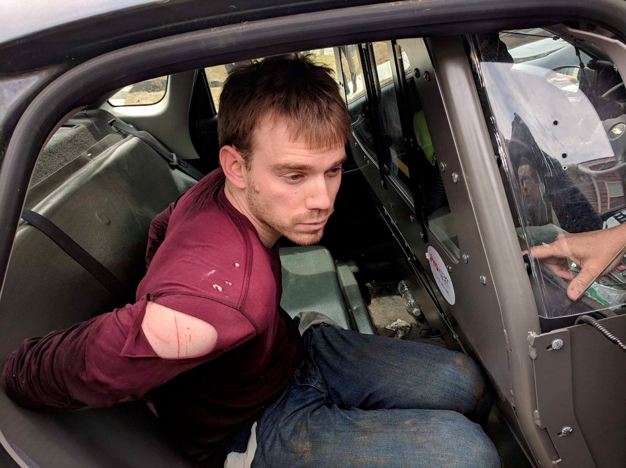 Travis Reinking, the suspect in a Waffle House shooting in Nashville, is under arrest by Metro Nashville Police Department in a wooded area in Antioch, Tennessee, U.S., April 23, 2018. (REUTERS Photo)