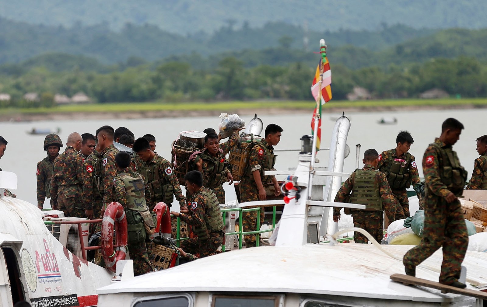 Myanmar soldiers arrive at Buthidaung jetty after the Arakan Rohingya Salvation Army's (ARSA) attacks, at Buthidaung, Myanmar August 29, 2017.